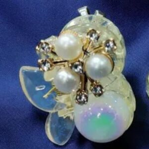 SINGLE PEARL CLUTCHER