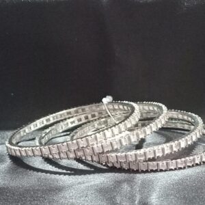 MILD PURPLE COLOUR  AD STONE BANGLES ( SET OF 4 )( 2*6)