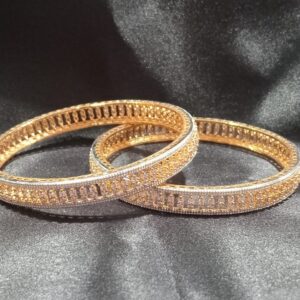 GOLD TONED BANGLES WITH AN INTRICATE FILIGREE  WHITE STONE ( SET OF 2 ) ( 2*4 / 2*6)